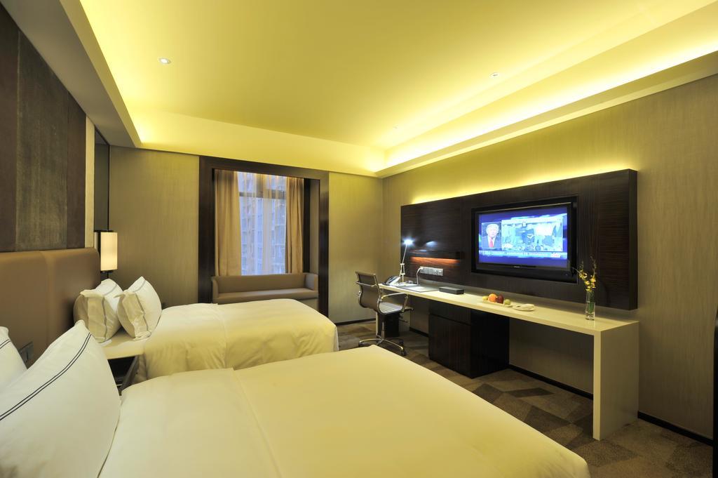 Royal Suites & Towers Wuhan Zimmer foto